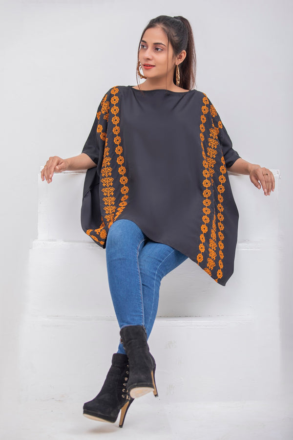 comfortable night to day wear, the poncho is embroidered