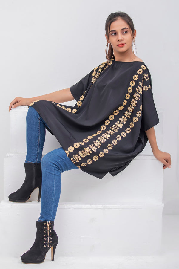 comfortable night to day wear, the poncho is embroidered